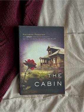 The Cabin by Natasha Preston - Paperback Novel with Red Rose Cover